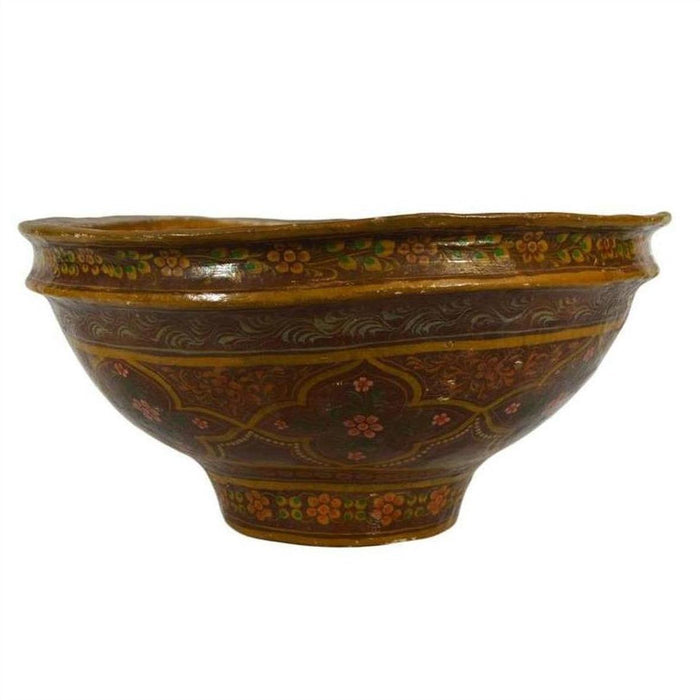 Close-up of brown ceramic Indian bowl with yellow, green, and red hand-painted floral and geometric designs.